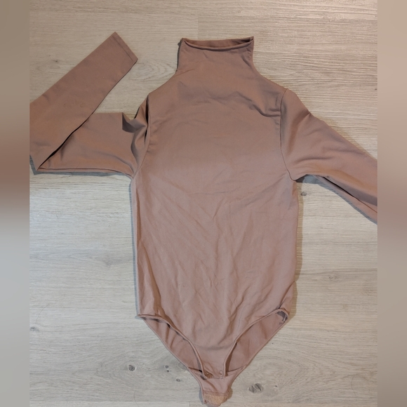 Two SKIMS Turtle Neck Bodysuits - Picture 4 of 5
